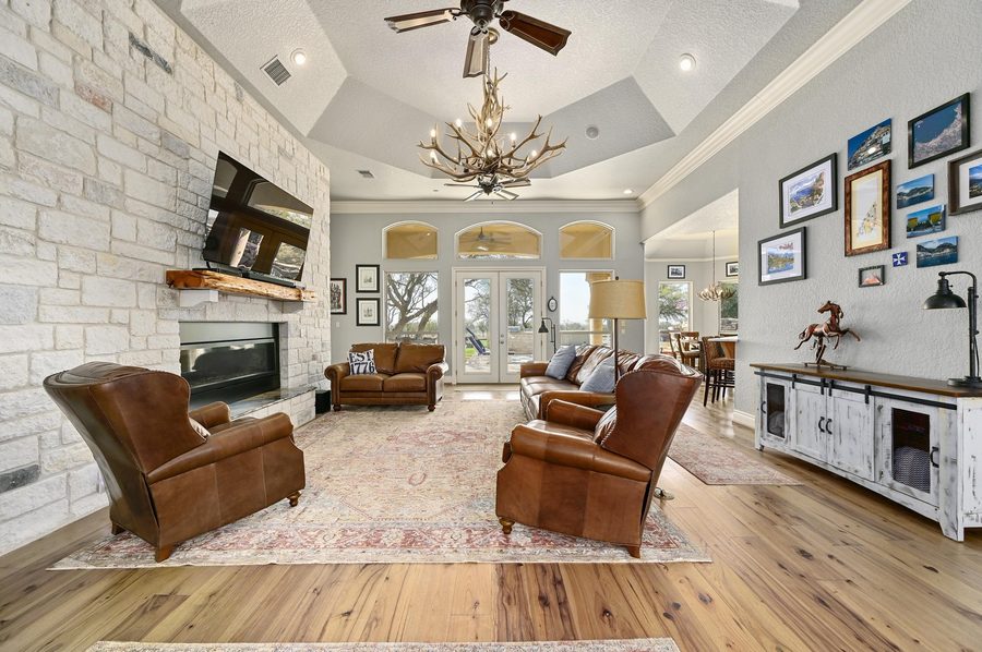 Living room with stone fireplace